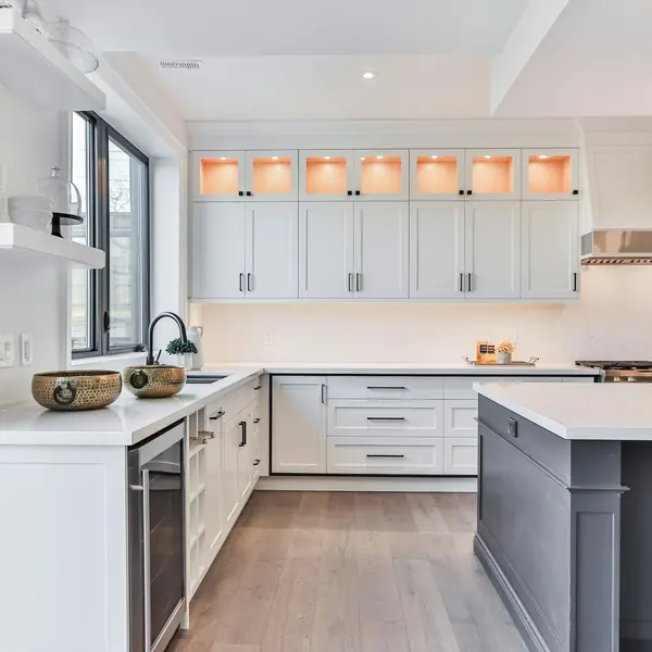 Bright kitchen with white and grey cabinets and an island